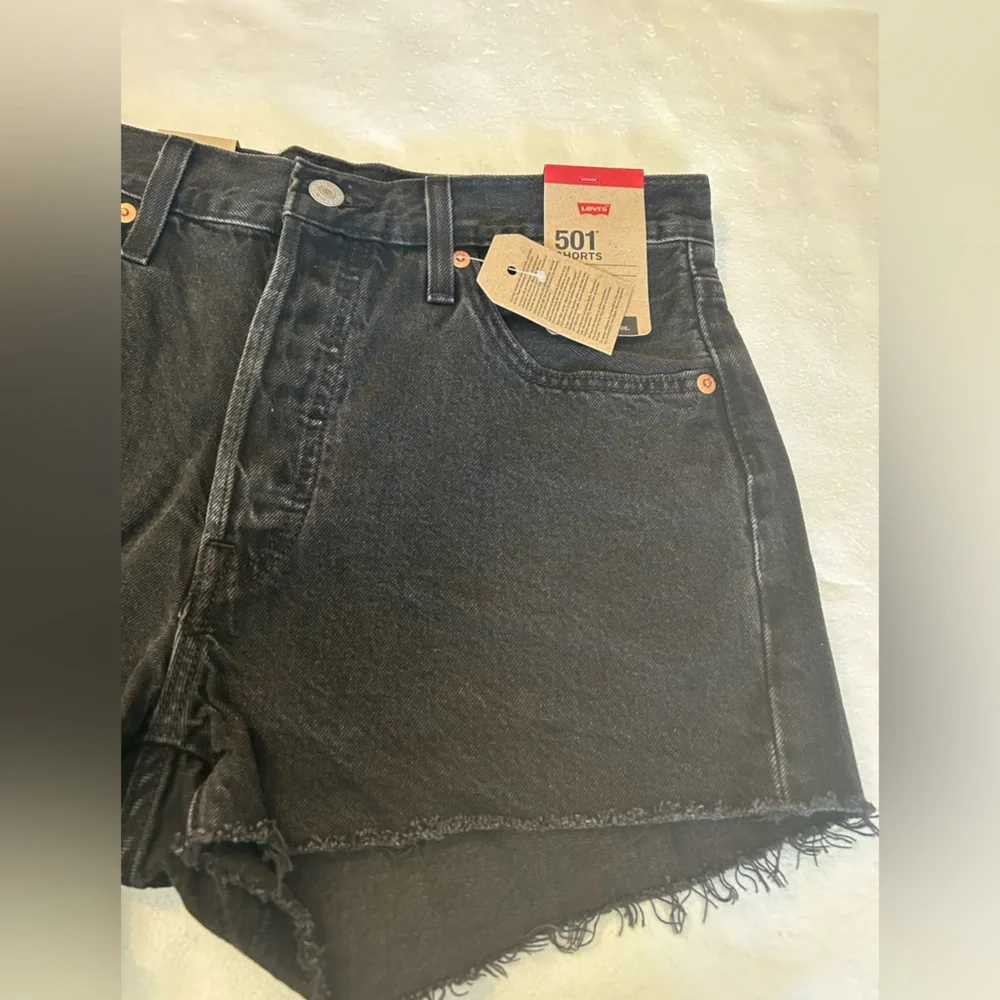 Levi’s NWT black 501 original fit high rise distressed black denim jean shorts